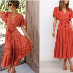 Petal and pup barker dress size 6 medium dress worn once, rust color